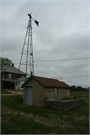 10000 CTH F, a Astylistic Utilitarian Building windmill, built in Fulton, Wisconsin in 1890.