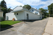 272 S MAIN ST, a Front Gabled small office building, built in Lake Mills, Wisconsin in 1932.