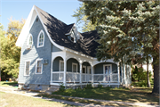 13-19 N MAIN ST, a Late Gothic Revival house, built in Clintonville, Wisconsin in 1915.
