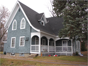 13-19 N MAIN ST, a Late Gothic Revival house, built in Clintonville, Wisconsin in 1915.