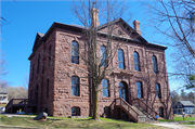 415 WASHINGTON, a Romanesque Revival courthouse, built in Bayfield, Wisconsin in 1883.