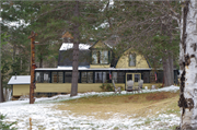 901 RITTENHOUSE AVE, a Dutch Colonial Revival house, built in Bayfield, Wisconsin in .
