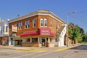 201 W MAPLE ST, a Commercial Vernacular retail building, built in Lancaster, Wisconsin in 1883.