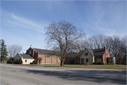 3307 West Deerfield Avenue, a Romanesque Revival house of worship, built in Suamico, Wisconsin in 1956.