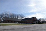 3307 West Deerfield Avenue, a Romanesque Revival house of worship, built in Suamico, Wisconsin in 1956.