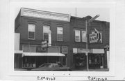 112-114 WALNUT ST, a Commercial Vernacular small retail building, built in Spooner, Wisconsin in 1905.