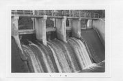 ACROSS TOTAGATIC RIVER AT S END OF MINONG FLOWAGE, VISIBLE FROM COUNTY HIGHWAY I, a NA (unknown or not a building) dam/lock, built in Minong, Wisconsin in 1925.