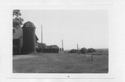END OF RISBERG RD OFF STATE HIGHWAY 86, 6 MI E OF OGEMA, a NA (unknown or not a building) silo, built in Hill, Wisconsin in 1904.