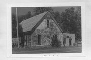 STATE HIGHWAY 48, a Front Gabled town hall, built in Grantsburg, Wisconsin in 1896.