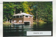 RAILROAD LAKE, a Rustic Style boat house, built in Commonwealth, Wisconsin in 1910.