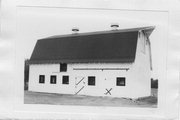 W SIDE OF PETERSON RD, AT END, a Astylistic Utilitarian Building barn, built in Homestead, Wisconsin in 1917.