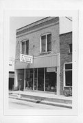 MAIN ST, E SIDE, BETWEEN MAPLE AND FRONT, a Commercial Vernacular hardware, built in Wild Rose, Wisconsin in 1908.
