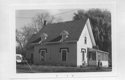 719 MAIN ST, a Early Gothic Revival house, built in Black River Falls, Wisconsin in 1875.