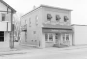 118 W MAIN ST, a Commercial Vernacular retail building, built in Waunakee, Wisconsin in .
