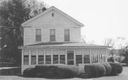 106 MAIN ST, a Greek Revival house, built in Montello, Wisconsin in 1874.