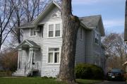 728 E IRVING AVE, a Queen Anne house, built in Oshkosh, Wisconsin in 1900.
