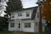700 Madison Avenue, a Dutch Colonial Revival house, built in South Milwaukee, Wisconsin in 1930.
