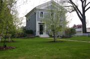 715-715A W 4TH AVE, a Greek Revival house, built in Oshkosh, Wisconsin in 1857.