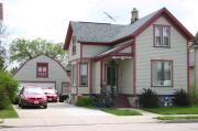 353 W SOUTH PARK AVE, a Gabled Ell house, built in Oshkosh, Wisconsin in 1900.