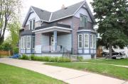 327 W SOUTH PARK AVE, a Cross Gabled house, built in Oshkosh, Wisconsin in 1900.