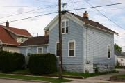 405-405A W 8TH AVE, a Gabled Ell house, built in Oshkosh, Wisconsin in 1900.