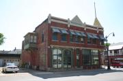 1124-1128 OREGON ST, a Queen Anne retail building, built in Oshkosh, Wisconsin in 1894.