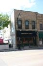 607 S Main St, a Italianate small retail building, built in Oshkosh, Wisconsin in 1870.
