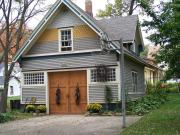 213 E SHERMAN AVE, a Queen Anne carriage house, built in Fort Atkinson, Wisconsin in 1885.