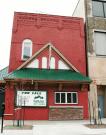 126 S ADAMS ST, a Commercial Vernacular small retail building, built in Green Bay, Wisconsin in 1910.