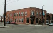 348 S WASHINGTON ST, a Commercial Vernacular retail building, built in Green Bay, Wisconsin in 1896.