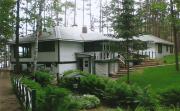 9264 HOWARD'S POINT RD (LAKE MINOCQUA), a Craftsman boat house, built in Minocqua, Wisconsin in 1947.