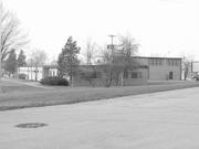 619 W. Wisconsin Ave., a Astylistic Utilitarian Building military base, built in Pewaukee, Wisconsin in 1960.