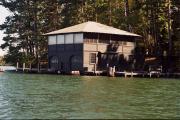 9276 HOWARD'S POINT RD ON LAKE MINOCQUA, a Craftsman boat house, built in Minocqua, Wisconsin in 1920.