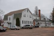 12  E 3RD ST, a Dutch Colonial Revival social recreational/fraternal hall, built in Washburn, Wisconsin in 1918.