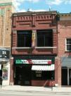 119 S WASHINGTON ST, a Commercial Vernacular small retail building, built in Green Bay, Wisconsin in 1905.