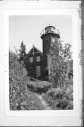 NE TIP SAND ISLAND, a Early Gothic Revival light house, built in Bayfield, Wisconsin in 1881.