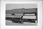 112-116 W BAYFIELD ST, a Commercial Vernacular large retail building, built in Washburn, Wisconsin in 1895.