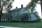 707 N BROADWAY ST, a Greek Revival house, built in De Pere, Wisconsin in 1836.