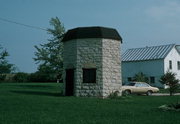 SE CNR OF BIG VALLEY RD AND EILLER RD, a Octagon well, built in Rockland, Wisconsin in 1885.