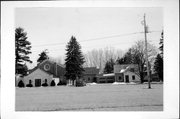 3307 West Deerfield Avenue, a Romanesque Revival house of worship, built in Suamico, Wisconsin in 1956.