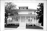 306 3RD ST, a American Foursquare rectory/parsonage, built in De Pere, Wisconsin in 1918.