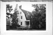 823 N BROADWAY ST, a Dutch Colonial Revival house, built in De Pere, Wisconsin in 1895.