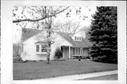 446 WILCOX CT, a Colonial Revival/Georgian Revival house, built in De Pere, Wisconsin in 1957.