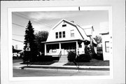 601-603 S ASHLAND AVE, a Dutch Colonial Revival duplex/two-flat, built in Green Bay, Wisconsin in 1905.