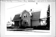 601-603 S ASHLAND AVE, a Dutch Colonial Revival duplex/two-flat, built in Green Bay, Wisconsin in 1905.