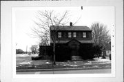 1113 DAY ST (moved from former location at 727 N WEBSTER AVE), a Dutch Colonial Revival house, built in Green Bay, Wisconsin in 1939.