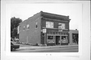 144 W PULASKI ST, a Commercial Vernacular small retail building, built in Pulaski, Wisconsin in 1920.