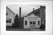 205 W PULASKI ST, a Commercial Vernacular blacksmith shop, built in Pulaski, Wisconsin in 1910.
