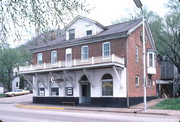 215 N MAIN ST, a Side Gabled general store, built in Alma, Wisconsin in 1861.