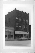 11 E CENTRAL ST, a Queen Anne small retail building, built in Chippewa Falls, Wisconsin in 1889.